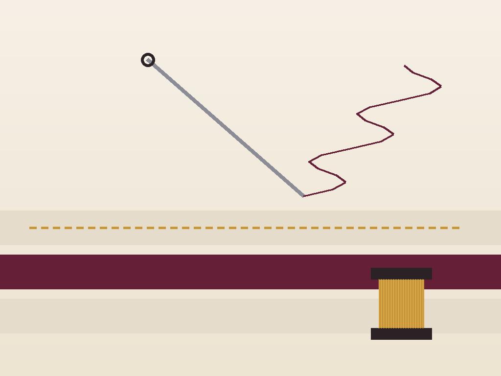 Tailor hand-hemming a garment with needle and thread